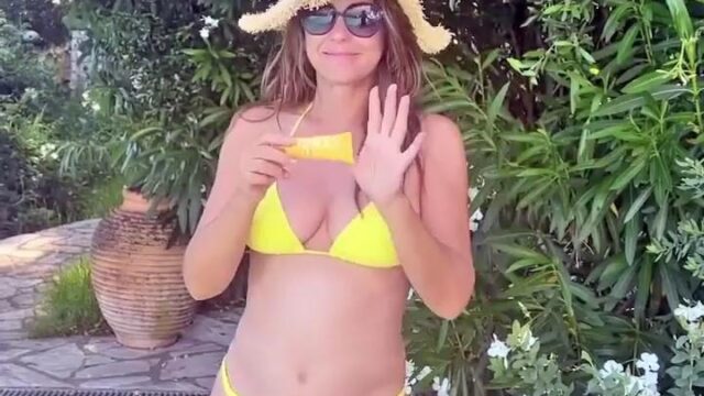 Elizabeth Hurley Looks Hot in a Yellow Bikini